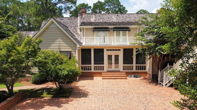 302 W 26th St, Tifton, GA 31794 - back of house featuring french doors, a balcony, and a chimney