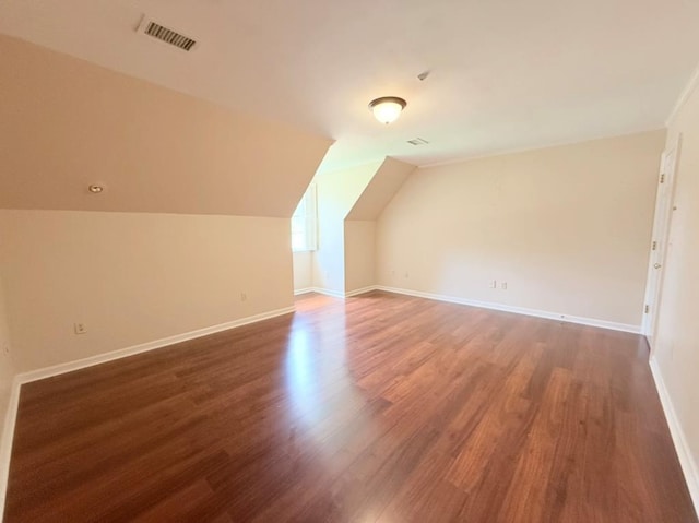 302 W 26th St, Tifton, GA 31794 - additional living space featuring wood finished floors and vaulted ceiling