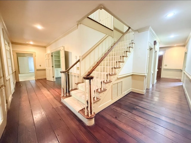 302 W 26th St, Tifton, GA 31794 - stairway with crown molding, wood-type flooring, and recessed lighting