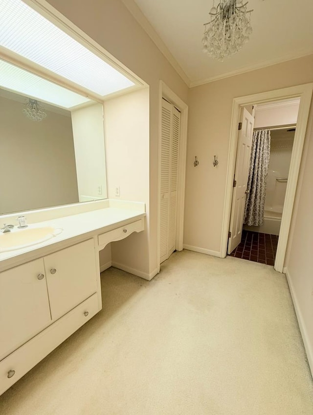 302 W 26th St, Tifton, GA 31794 - full bathroom featuring vanity, a chandelier, carpet floors, and ornamental molding