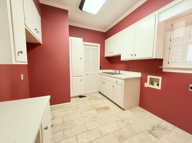 302 W 26th St, Tifton, GA 31794 - laundry room featuring cabinet space, hookup for a washing machine, and ornamental molding