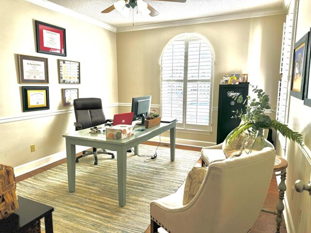 11 Ridgewood Dr, Tifton, GA 31793 - office with baseboards, a textured ceiling, crown molding, ceiling fan, and wood finished floors