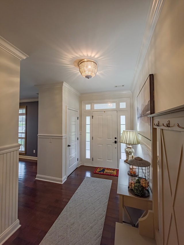 74 Surrey Cir, Tifton, GA 31793 - entrance foyer featuring wood finished floors, ornamental molding, and wainscoting
