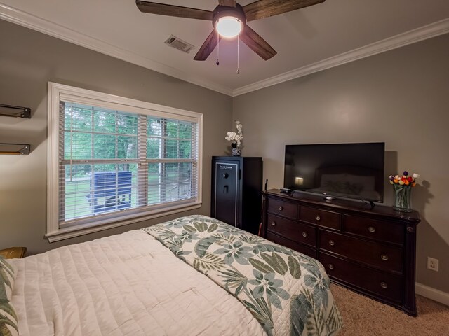 74 Surrey Cir, Tifton, GA 31793 - bedroom with light colored carpet, ornamental molding, and ceiling fan
