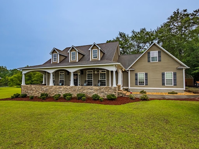 74 Surrey Cir, Tifton, GA 31793 - view of front of home featuring a porch, a front yard, and roof with shingles