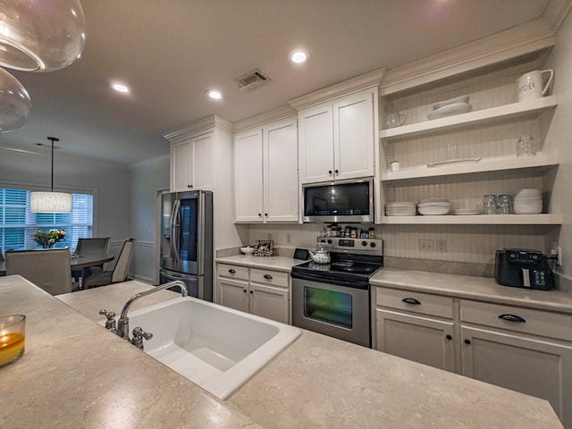74 Surrey Cir, Tifton, GA 31793 - kitchen featuring stainless steel appliances, open shelves, light countertops, ornamental molding, and tasteful backsplash
