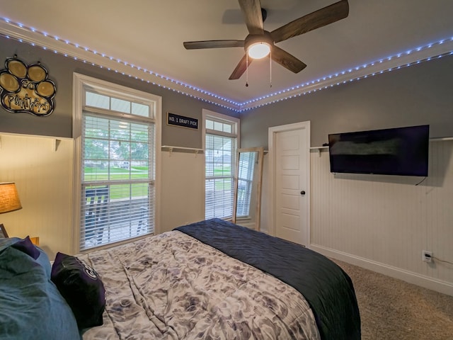 74 Surrey Cir, Tifton, GA 31793 - bedroom featuring carpet floors, wood walls, and a wainscoted wall