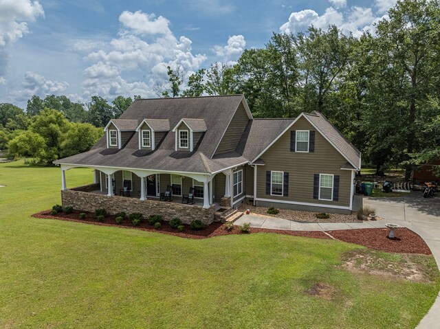 74 Surrey Cir, Tifton, GA 31793 - cape cod-style house with a porch, a front lawn, and roof with shingles