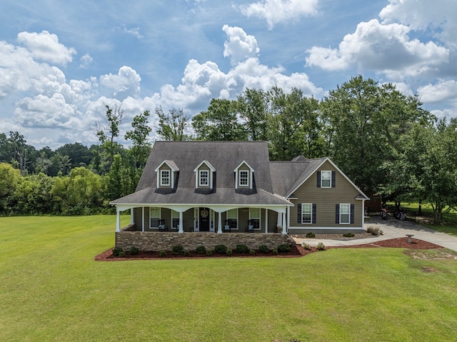 74 Surrey Cir, Tifton, GA 31793 - cape cod-style house with a porch, a front yard, and stone siding