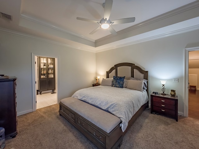 74 Surrey Cir, Tifton, GA 31793 - bedroom featuring carpet flooring, a raised ceiling, ornamental molding, and ceiling fan
