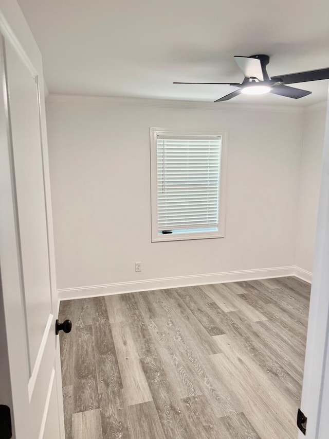 702 N Livingston St, Sylvester, GA 31791 - unfurnished room featuring crown molding, ceiling fan, and wood finished floors
