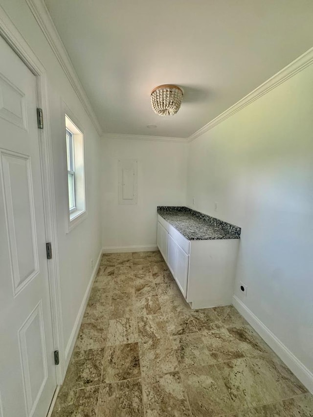 702 N Livingston St, Sylvester, GA 31791 - washroom featuring ornamental molding, stone finish floors, and electric panel