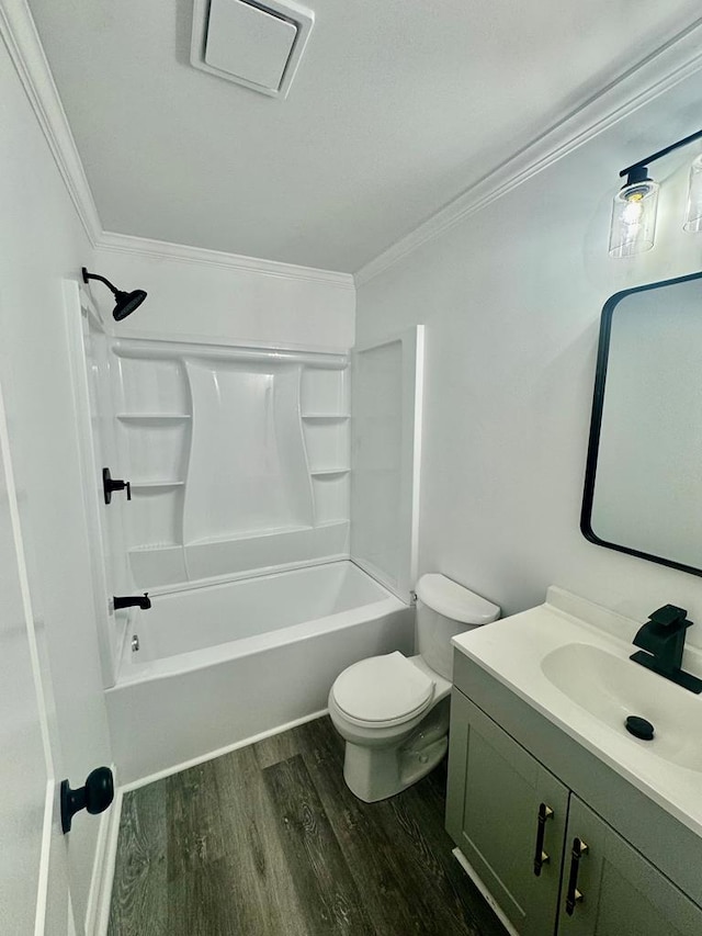 702 N Livingston St, Sylvester, GA 31791 - full bath featuring wood finished floors, vanity, ornamental molding, and bathing tub / shower combination