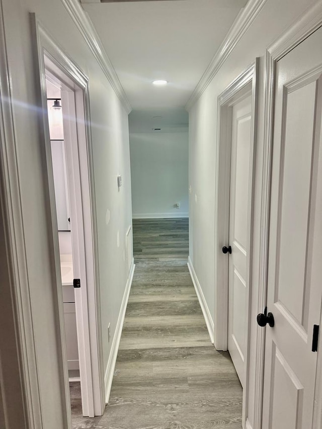 702 N Livingston St, Sylvester, GA 31791 - corridor featuring light wood-style floors and crown molding