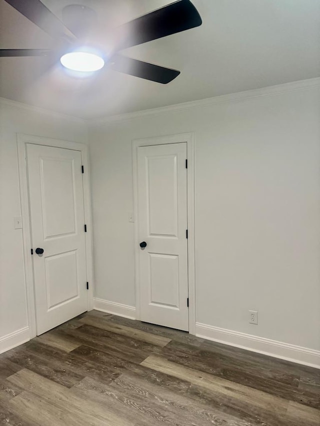 702 N Livingston St, Sylvester, GA 31791 - empty room with ornamental molding and dark wood-style flooring