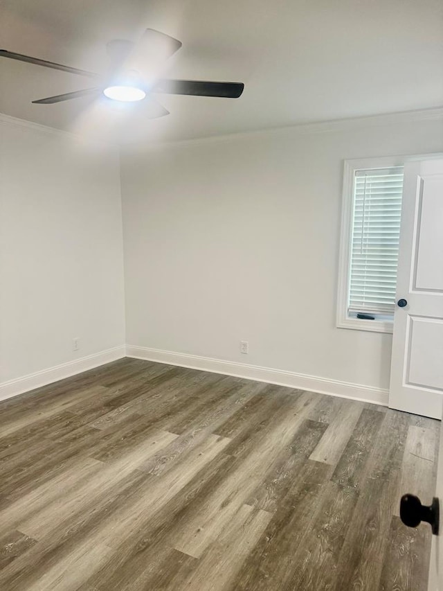 702 N Livingston St, Sylvester, GA 31791 - spare room with ornamental molding, a ceiling fan, and wood finished floors