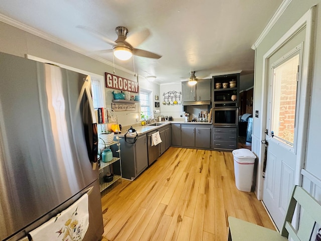 kitchen featuring ceiling fan, open shelves, and stainless steel appliances