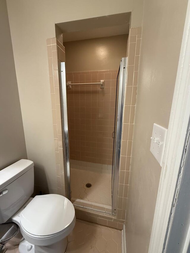 2411 Davis Ave, Tifton, GA 31794 - full bath with a stall shower and tile patterned flooring