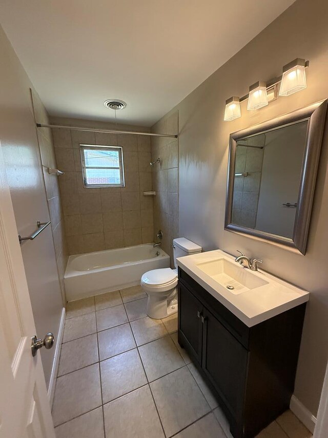 2411 Davis Ave, Tifton, GA 31794 - bathroom with tile patterned floors, vanity, and shower / bath combination