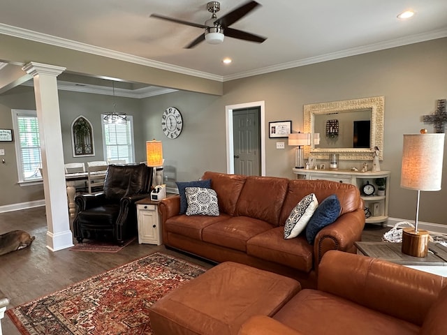 living room featuring a ceiling fan, dark wood finished floors, baseboards, ornate columns, and recessed lighting