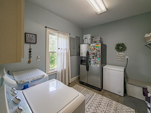 114 Creole Ct, Fitzgerald, GA 31750 - kitchen featuring stainless steel fridge with ice dispenser, fridge, washer / clothes dryer, and light tile patterned floors