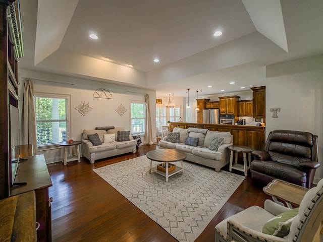 114 Creole Ct, Fitzgerald, GA 31750 - living area with a raised ceiling, dark wood-style floors, a chandelier, and recessed lighting