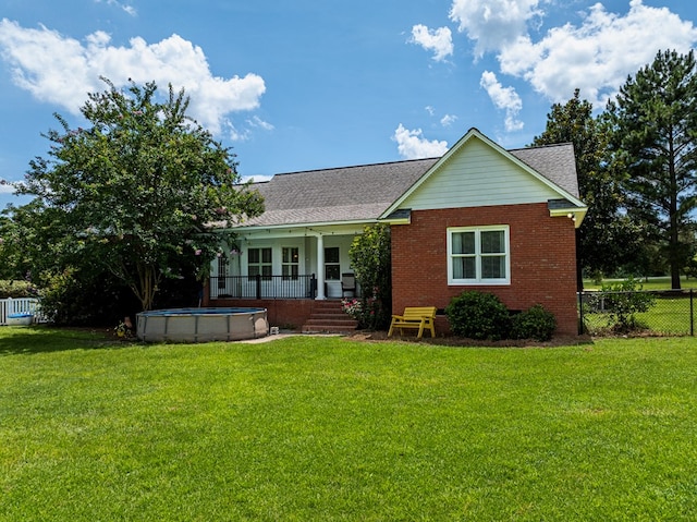 114 Creole Ct, Fitzgerald, GA 31750 - view of front of house featuring brick siding and roof with shingles