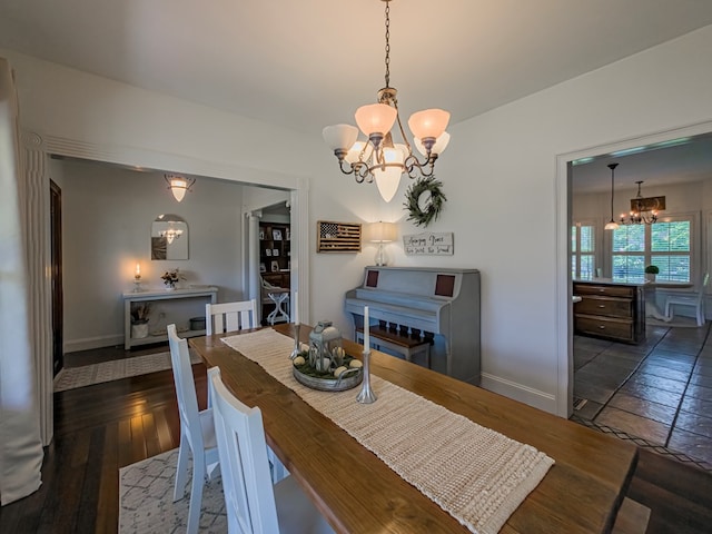 114 Creole Ct, Fitzgerald, GA 31750 - dining area featuring a chandelier and wood finished floors