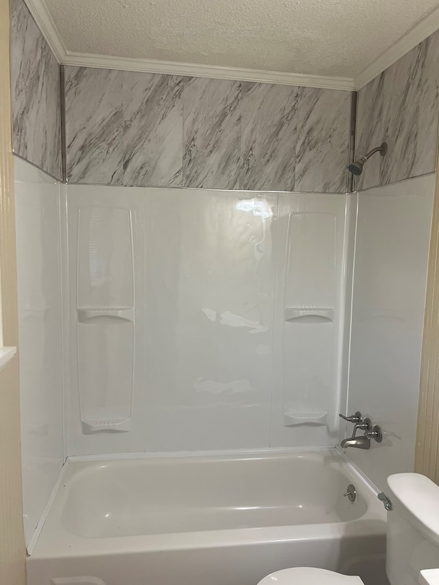 bathroom featuring toilet, a textured ceiling, crown molding, and shower / bathing tub combination