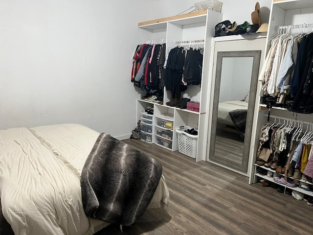 bedroom with wood finished floors