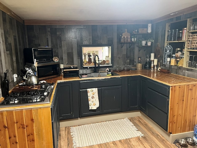 kitchen with a sink and appliances with stainless steel finishes