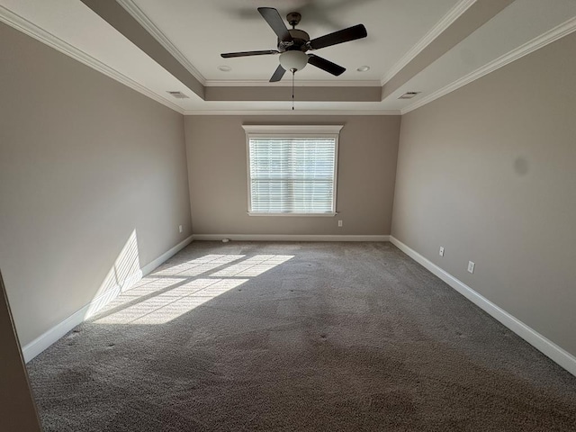 564 Osprey Cir, Tifton, GA 31794 - unfurnished room featuring a raised ceiling, crown molding, carpet flooring, and a ceiling fan
