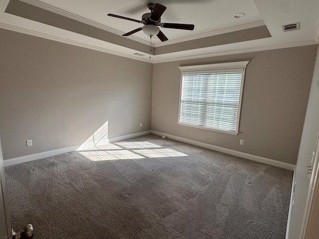 564 Osprey Cir, Tifton, GA 31794 - empty room with a tray ceiling, crown molding, carpet, and a ceiling fan
