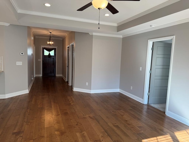 564 Osprey Cir, Tifton, GA 31794 - entrance foyer featuring a chandelier, dark wood-style floors, ceiling fan, a tray ceiling, and ornamental molding