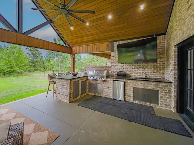 113 N Pointe Dr, Fitzgerald, GA 31750 - view of patio featuring a grill, an outdoor kitchen, a sink, and ceiling fan