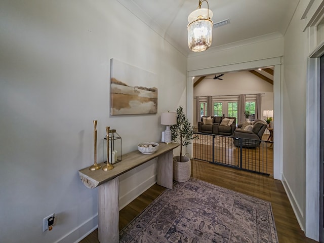 113 N Pointe Dr, Fitzgerald, GA 31750 - foyer entrance with wood finished floors, ornamental molding, baseboards, ceiling fan, and vaulted ceiling