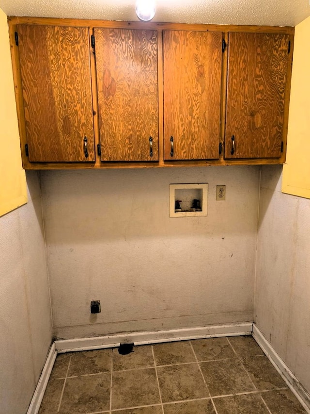 358 Camp Brooklyn Rd, Fitzgerald, GA 31750 - washroom featuring cabinet space, hookup for a washing machine, and baseboards