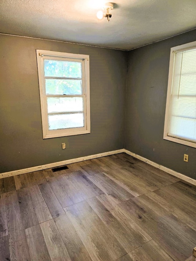 358 Camp Brooklyn Rd, Fitzgerald, GA 31750 - spare room featuring wood finished floors and baseboards