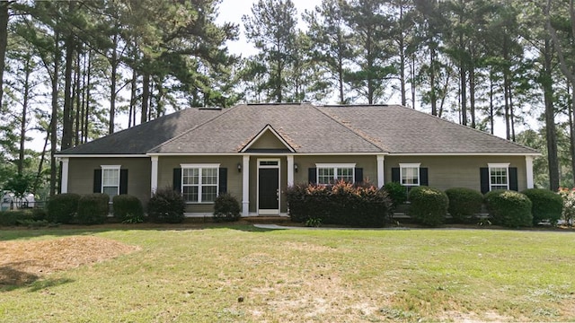 218 Sutton Rd, Tifton, GA 31794 - view of front of home with a front lawn and a shingled roof