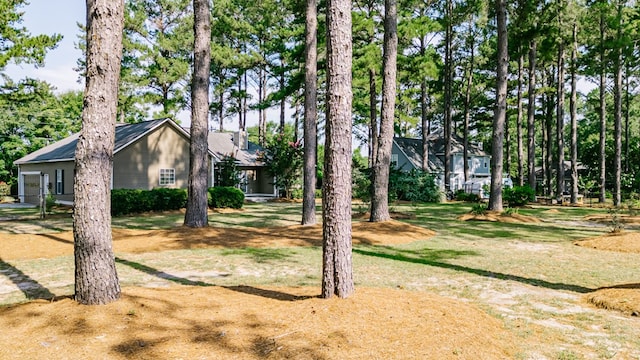 218 Sutton Rd, Tifton, GA 31794 - view of yard with an attached garage