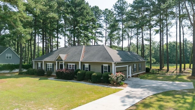 218 Sutton Rd, Tifton, GA 31794 - view of front of property featuring a garage, a front yard, and driveway