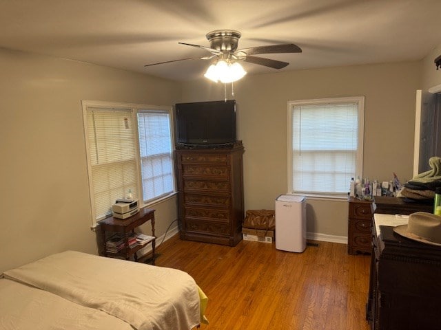 602 20th St, Tifton, GA 31794 - bedroom featuring baseboards, ceiling fan, and wood finished floors