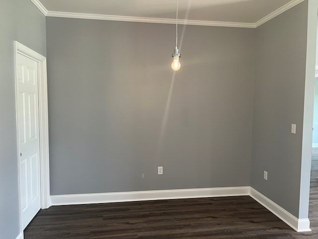 64 Mcintosh Pl, Moultrie, GA 31788 - unfurnished dining area featuring dark wood-style flooring, baseboards, and crown molding
