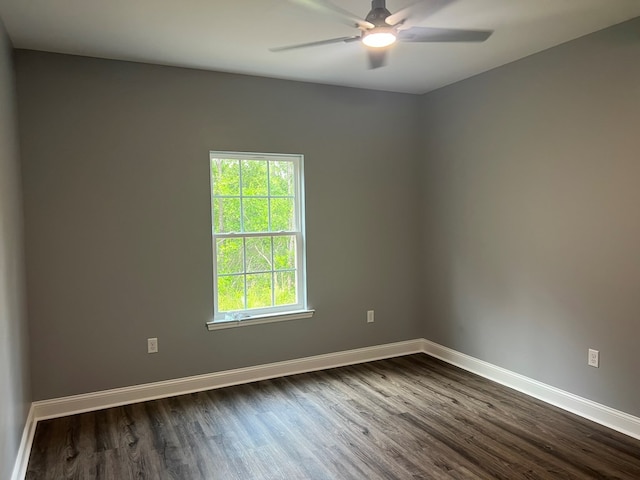 64 Mcintosh Pl, Moultrie, GA 31788 - spare room with dark wood-type flooring, baseboards, and ceiling fan