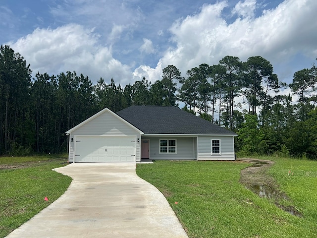 64 Mcintosh Pl, Moultrie, GA 31788 - ranch-style house featuring driveway, a front lawn, and a garage