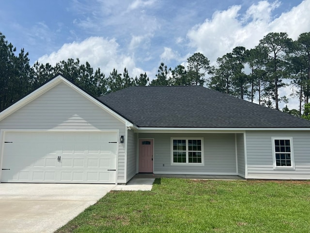 64 Mcintosh Pl, Moultrie, GA 31788 - single story home featuring a garage, concrete driveway, a front lawn, and a shingled roof
