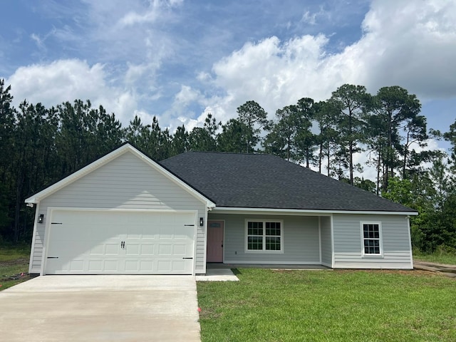64 Mcintosh Pl, Moultrie, GA 31788 - single story home featuring concrete driveway, an attached garage, a front yard, and a shingled roof