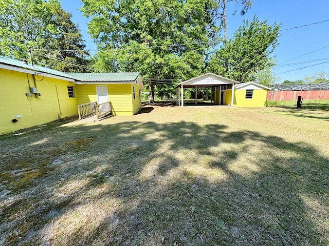 118 Flint St, Fitzgerald, GA 31750 - view of yard with a detached carport