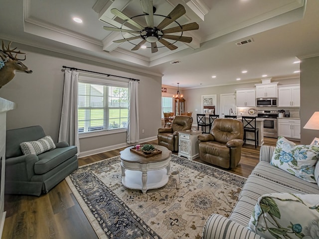 105 Planters Row, Tifton, GA 31793 - living room with crown molding, ceiling fan, dark wood-style flooring, beam ceiling, and a chandelier