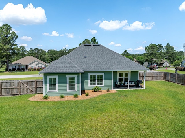 105 Planters Row, Tifton, GA 31793 - rear view of property with a shingled roof and a patio